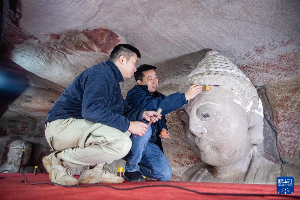 与历史对话 把文物唤醒——600年摩崖造像风采重现