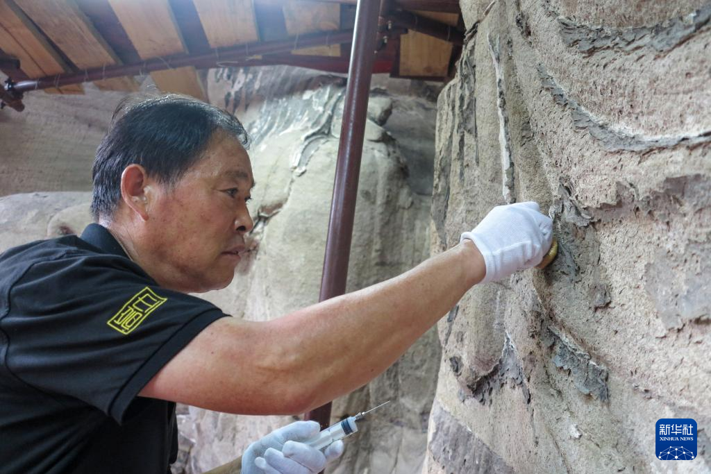 与历史对话 把文物唤醒——600年摩崖造像风采重现